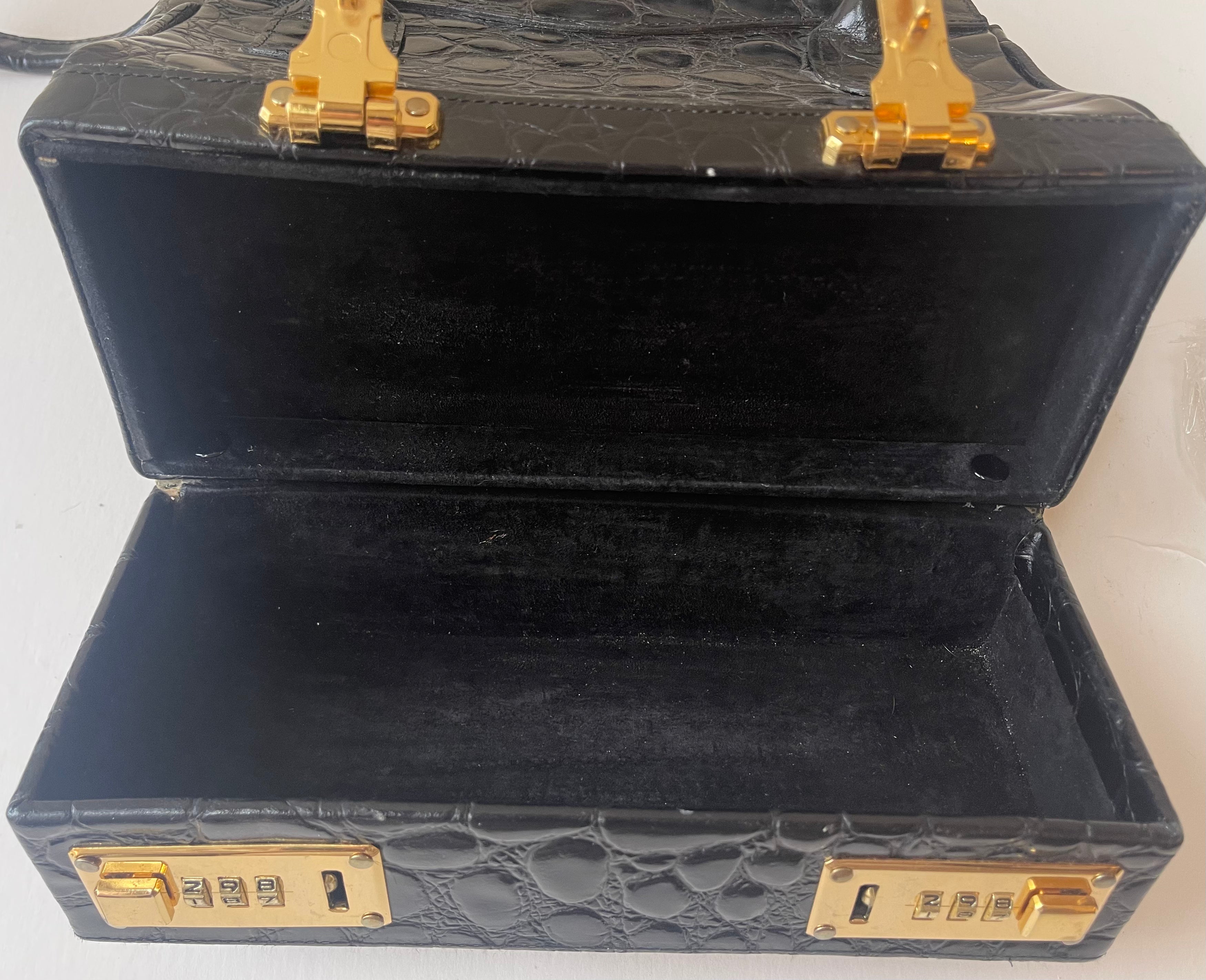 Carla Mancini Croc Embossed Lock Compartment Handbag
